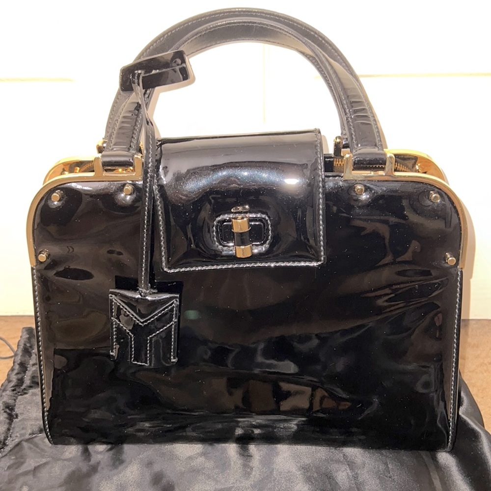 The Yves Saint Laurent Black Patent Leather Medium Uptown Bag